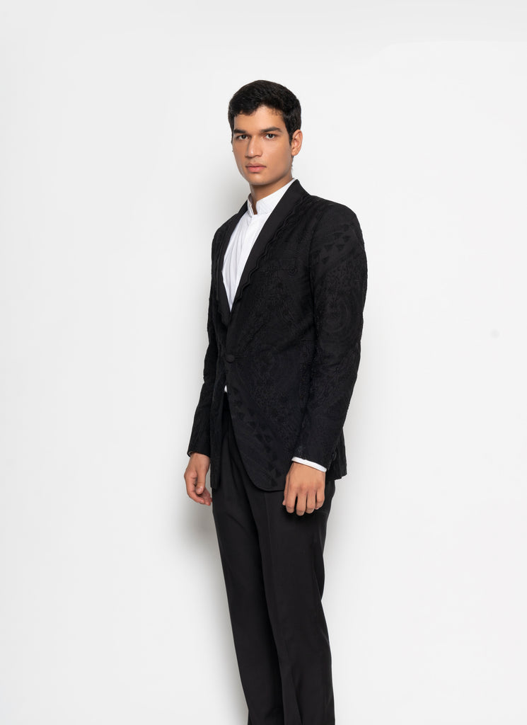 Fine beaded embrodery and a wave edged collar makes this a statement tux for the rebellious dresser.